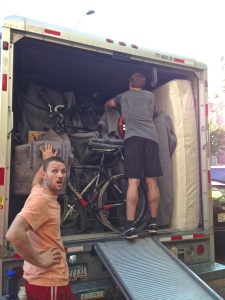 Dan securing stuff in the moving truck while Jon holds down the fort on our last night in Seattle.