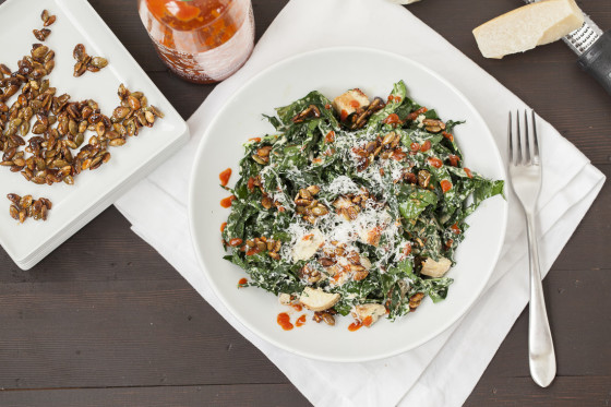 Spicy Kale Caesar with Chicken and Candied Pepitas